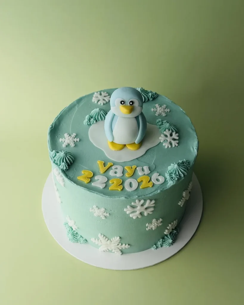 Mintgroene taart met pinguïn